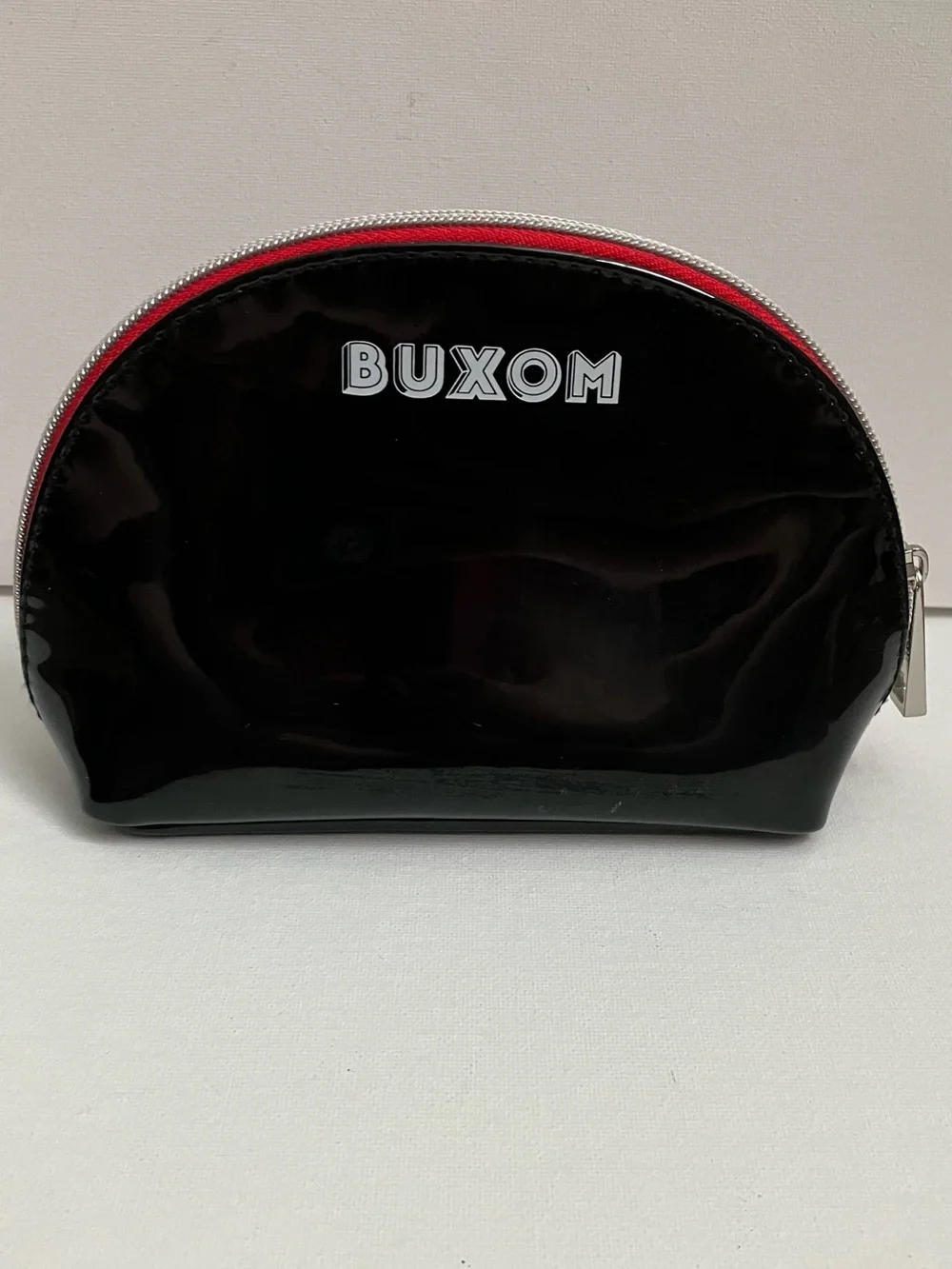 Buxom glossy black